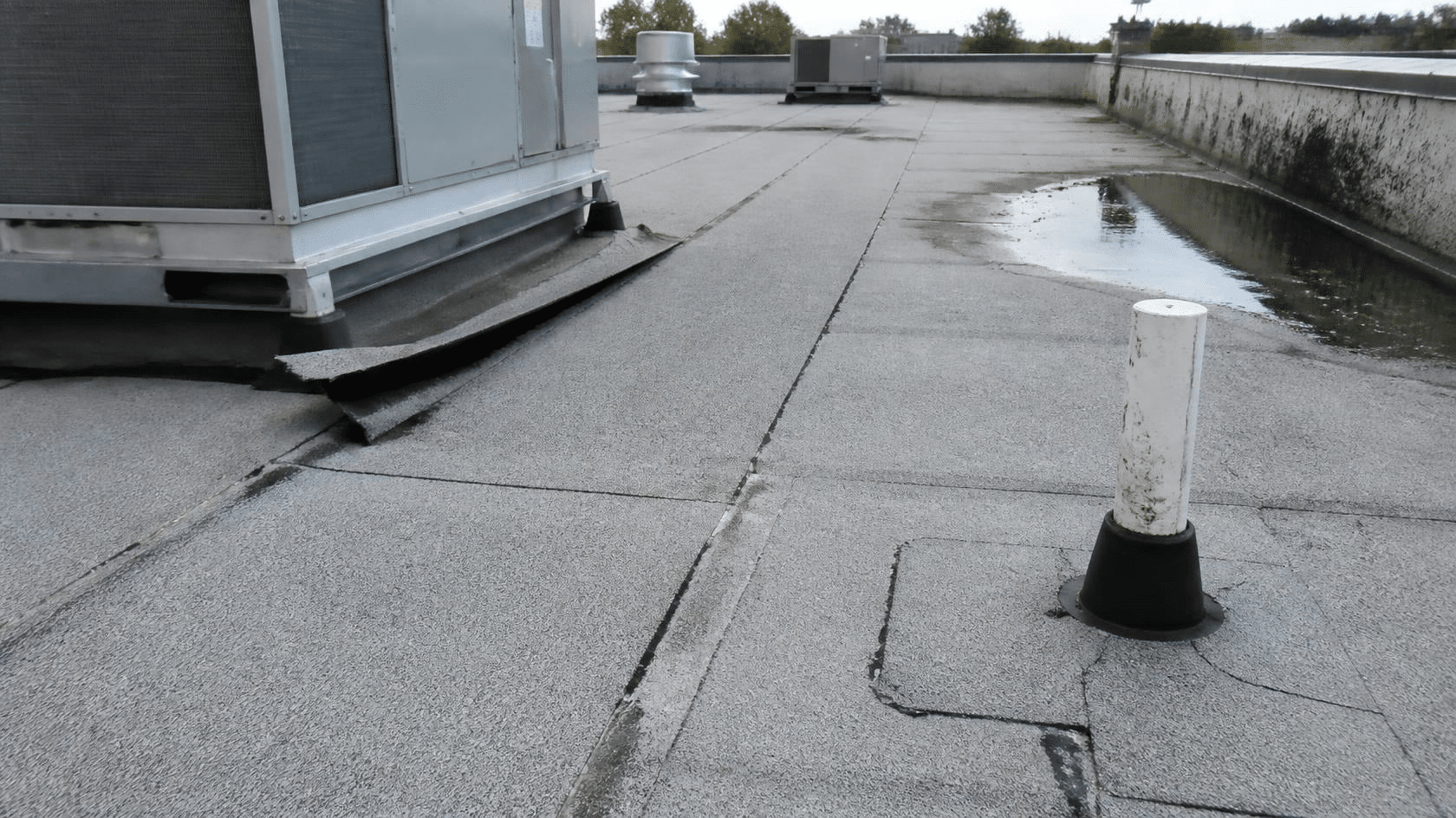 Flat commercial roof with ponding water in Shreveport, LA.