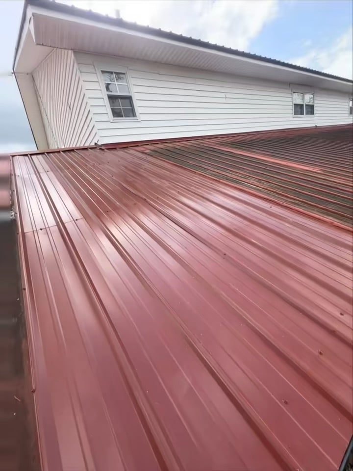 Red corrugated metal roof panels, one of the roofing material options Blue Note Pros installs in Shreveport