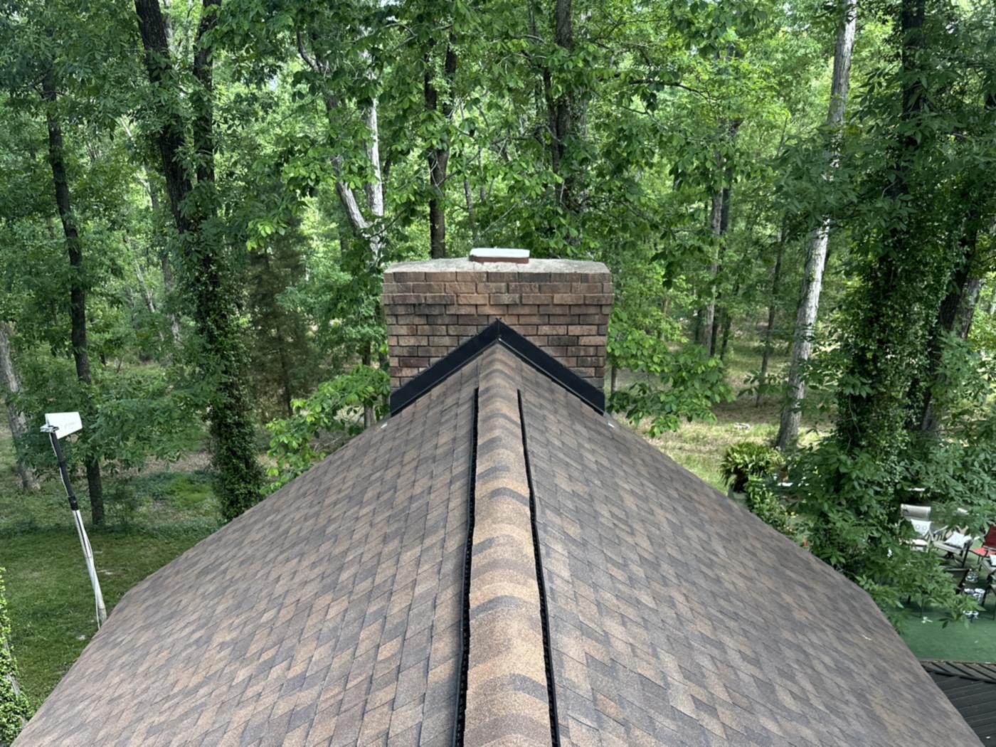 Ridge cap shingles and ridge vent on a Shreveport home