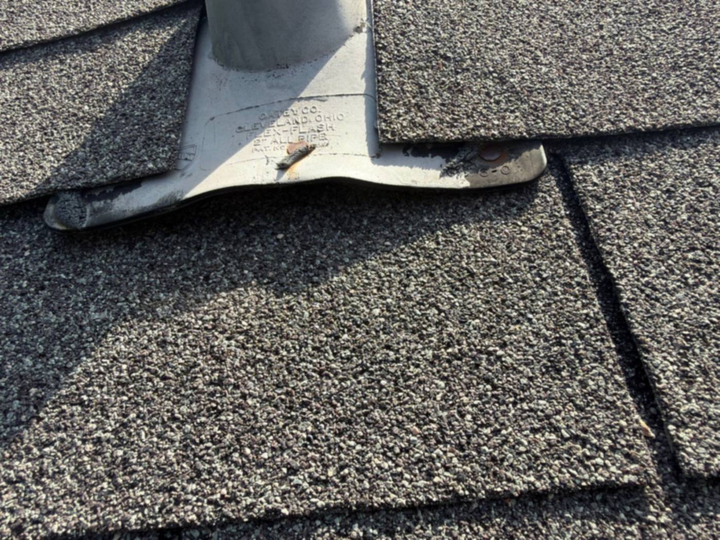 Pipe boot flashing installed on asphalt shingles in Shreveport