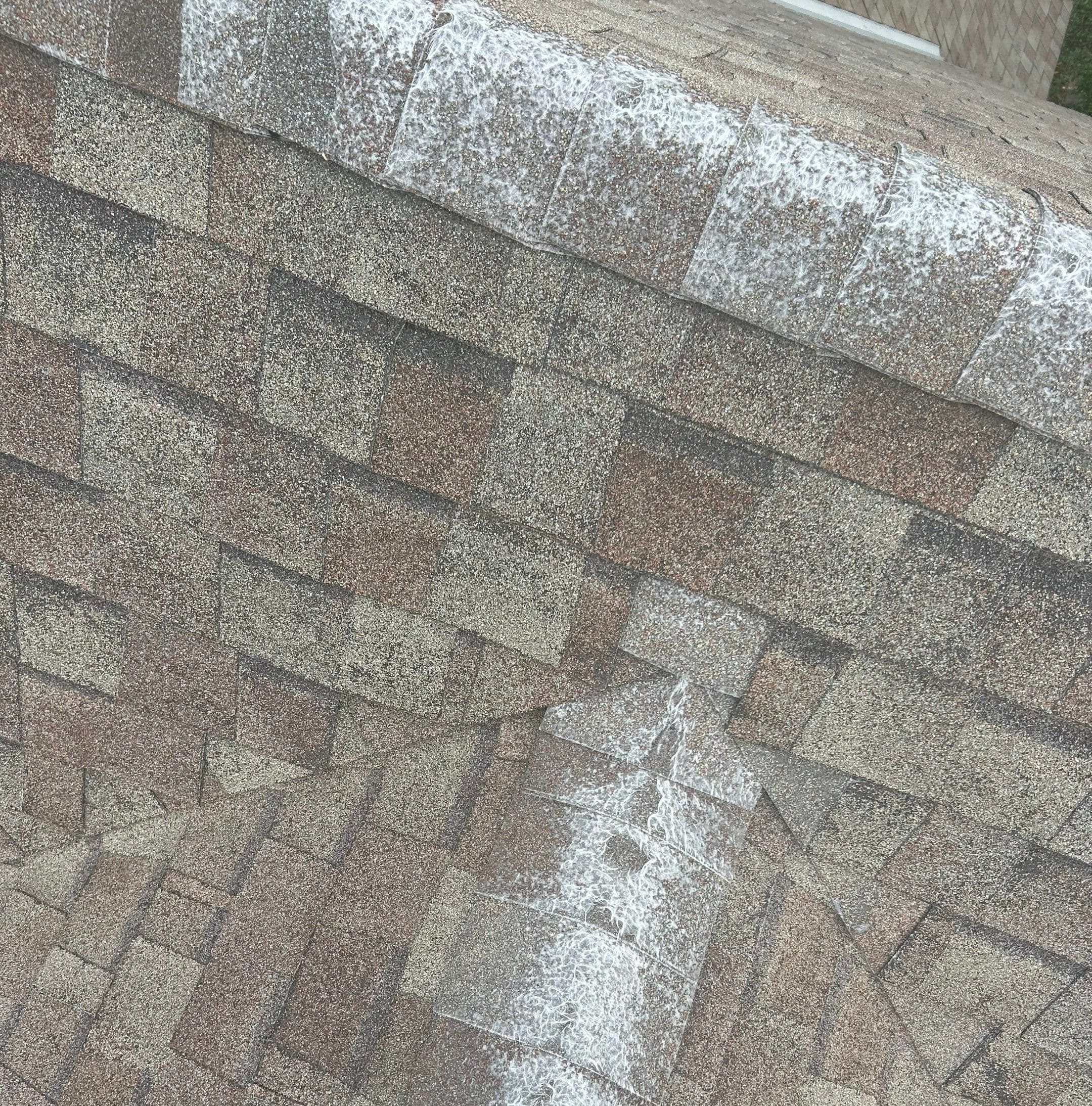 Close-up of a shingled roof valley where two roof slopes meet on a Shreveport home