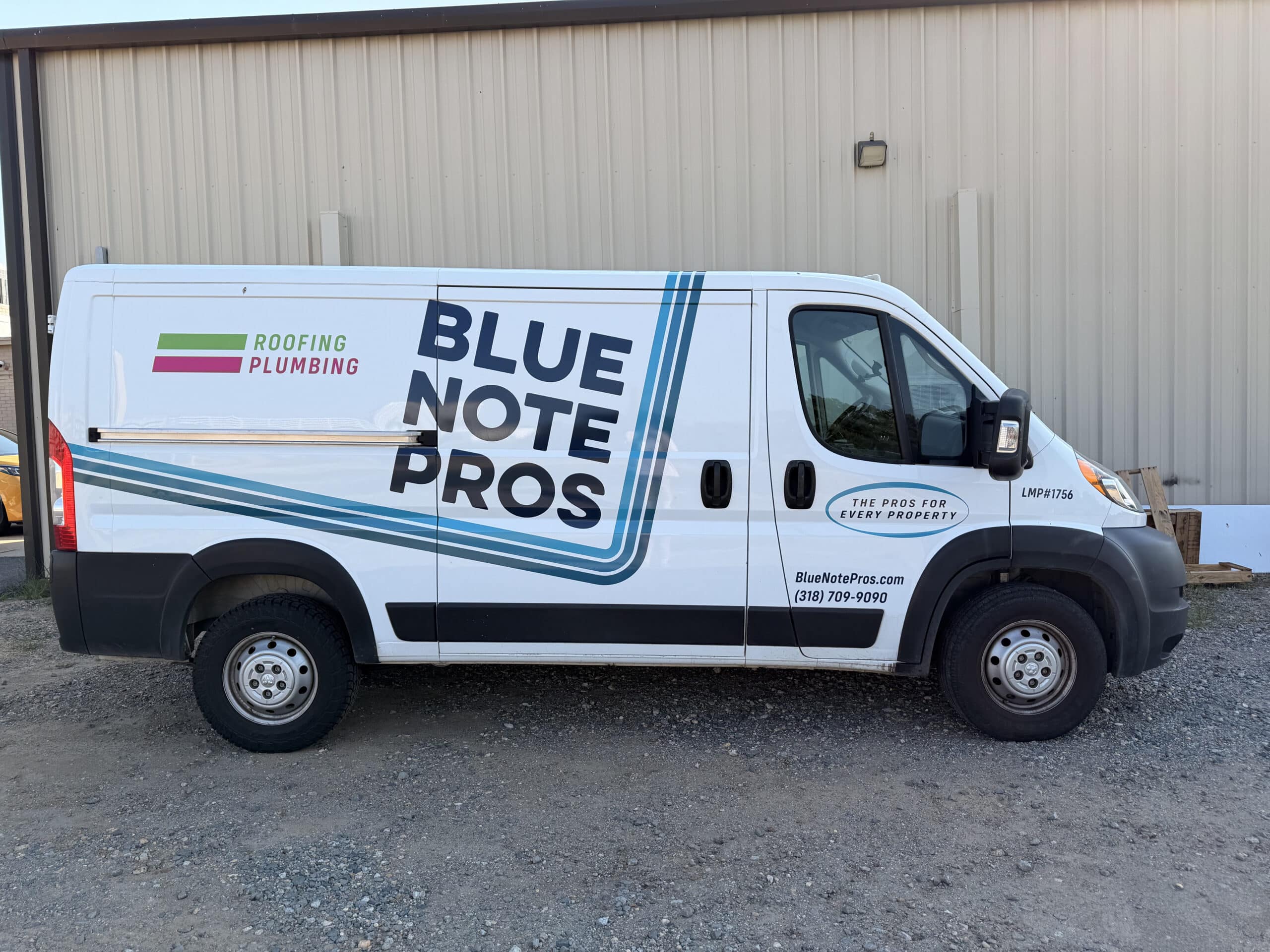 Blue Note Pros roofing service van parked outside the shop, ready for roof repair calls in Shreveport and Bossier City