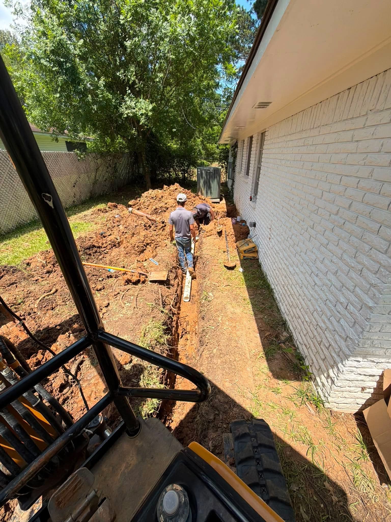 Blue Note Pros plumber cutting into a leaking outdoor water line after a pipe burst in Shreveport